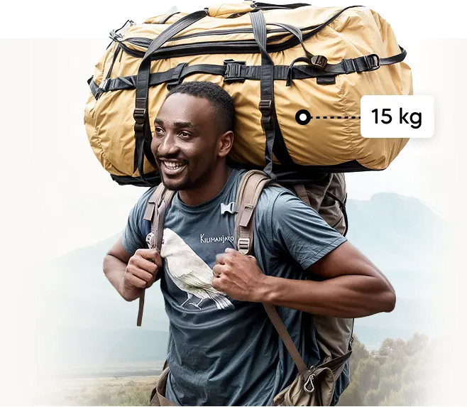 Kilimandscharo-Träger mit einer 15 kg schweren Expeditions-Duffel-Bag Kilimandscharo-Träger mit einer 15 kg schweren Expeditions-Duffel-Bag